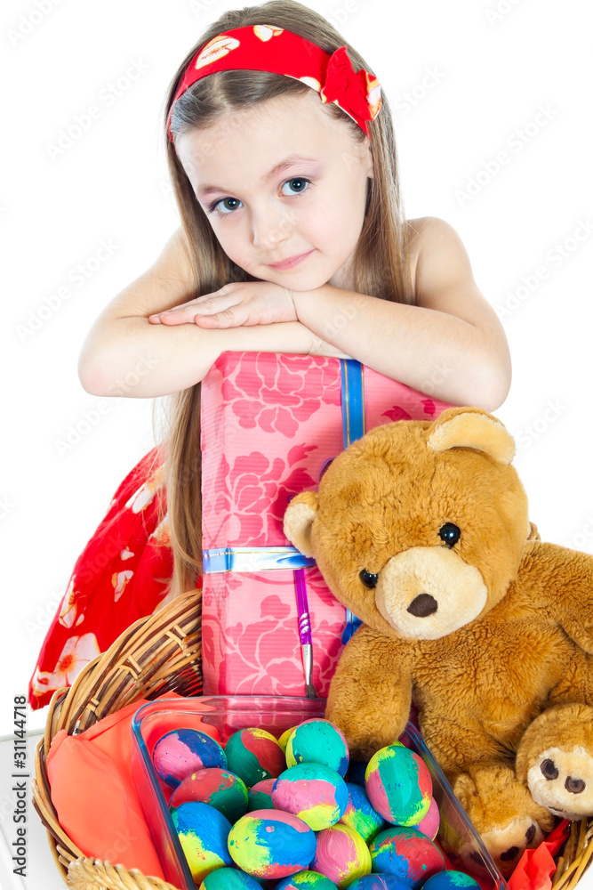 cute little girls with Easter eggs and gifts isolated on white cute little girls with Easter eggs and gifts isolated on white