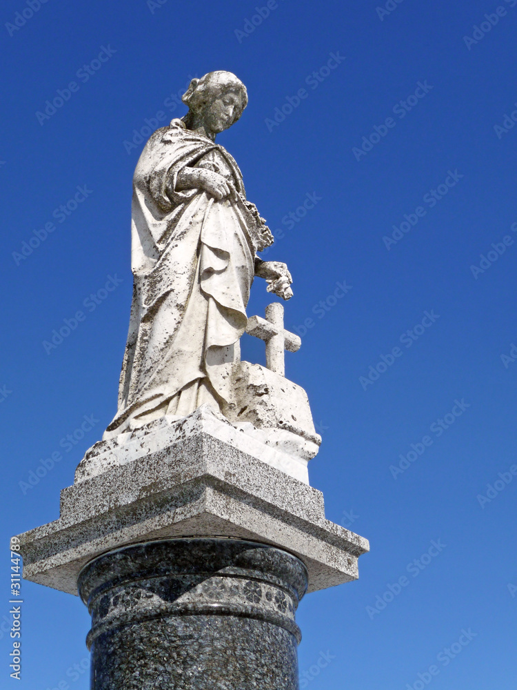 Nineteenth century cemetery statue woman with roses