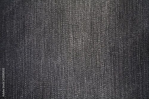 Dark jeans fabric with a visible structure as a background