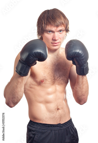 Young caucasian man boxer.