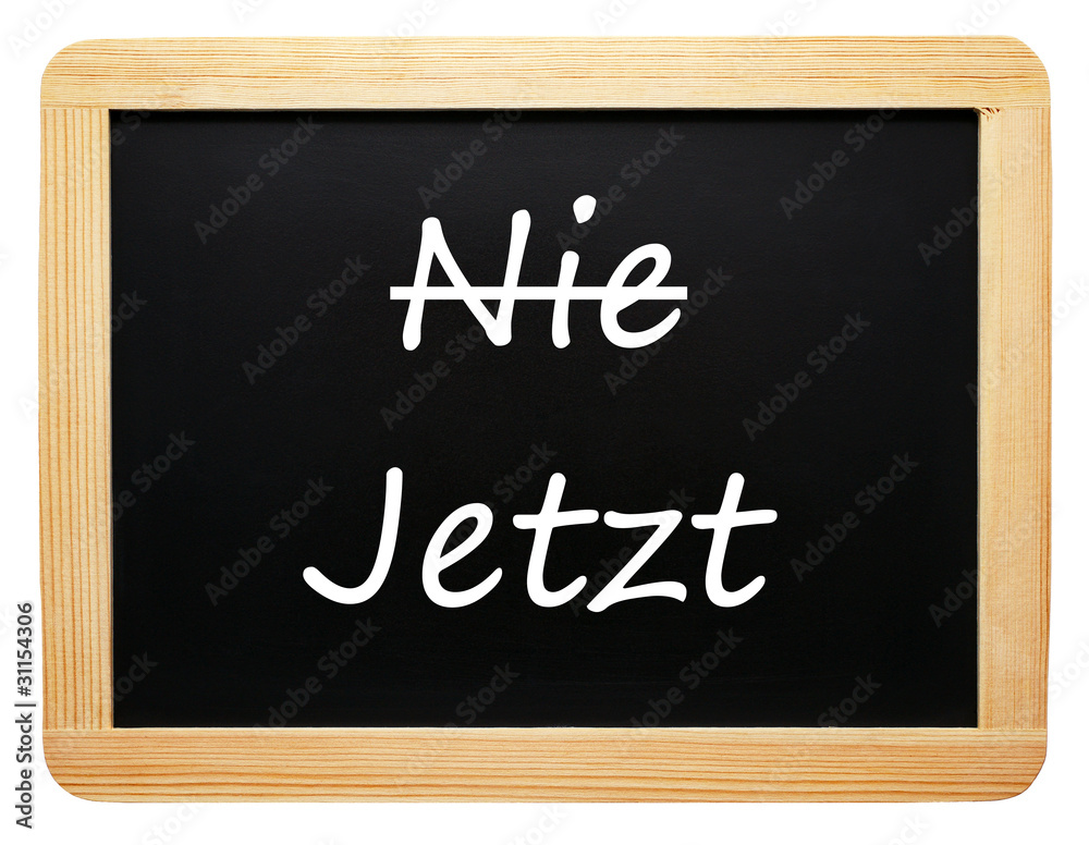 Fototapeta premium Nie / Jetzt - Konzept Tafel - freigestellt