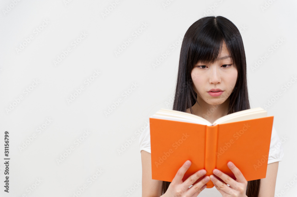 beautiful asian woman reading a book beautiful asian woman reading a book