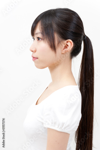 beautiful asian woman with ponytail style hair photo
