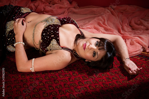 Beautiful Belly Dancer Lying Down