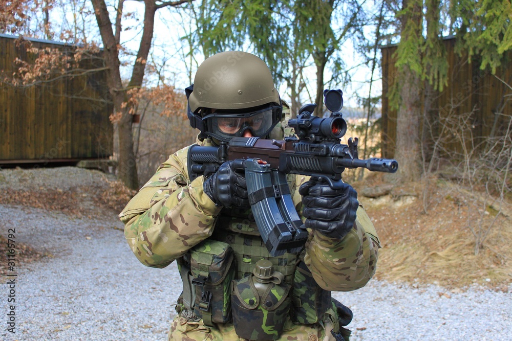 Fototapeta premium soldier with an assault rifle SA vz.58