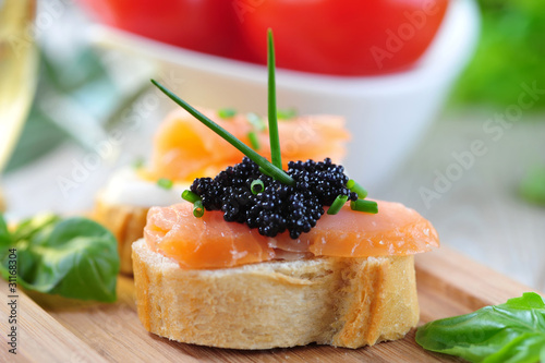 baguette mit lachs und kaviar photo