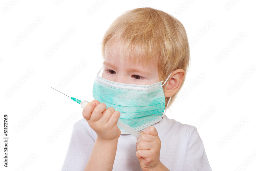 boy in a mask holding a syringe boy in a mask holding a syringe
