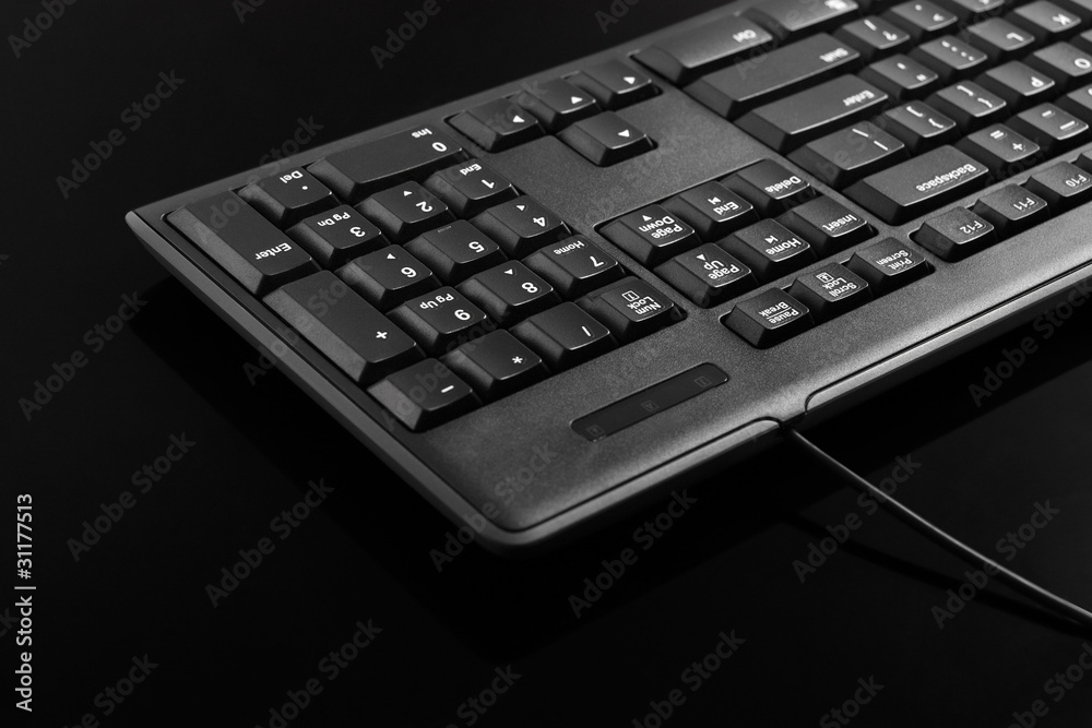 black keyboard on black background