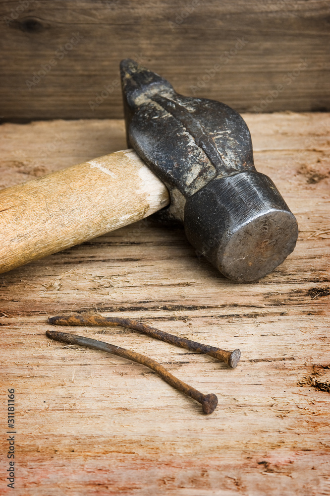 hammer with a rusty nail