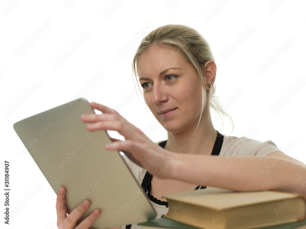 Young Female Student Happily Studying using Tablet computer Young Female Student Happily Studying using Tablet computer