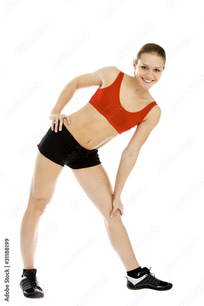 Pretty fitness instructor posing against white background Pretty fitness instructor posing against white background