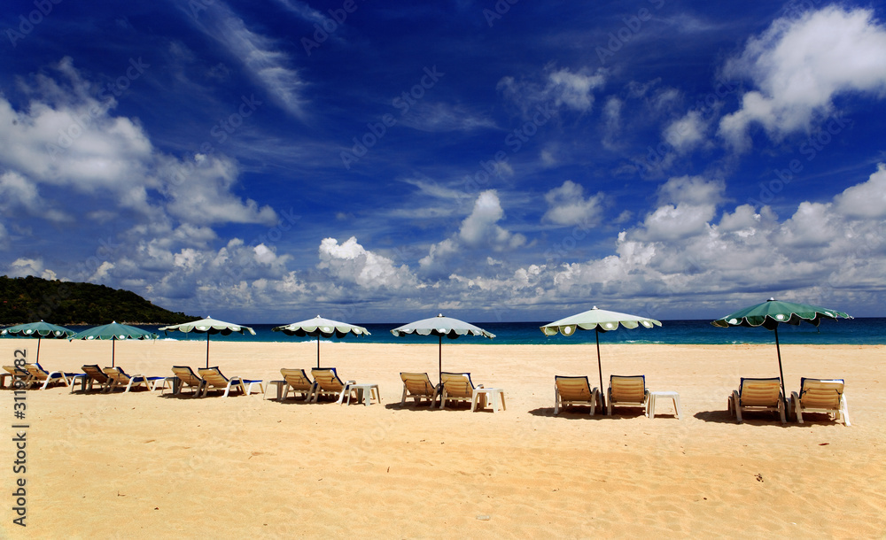Umbrellas and chaise lounges on a beach