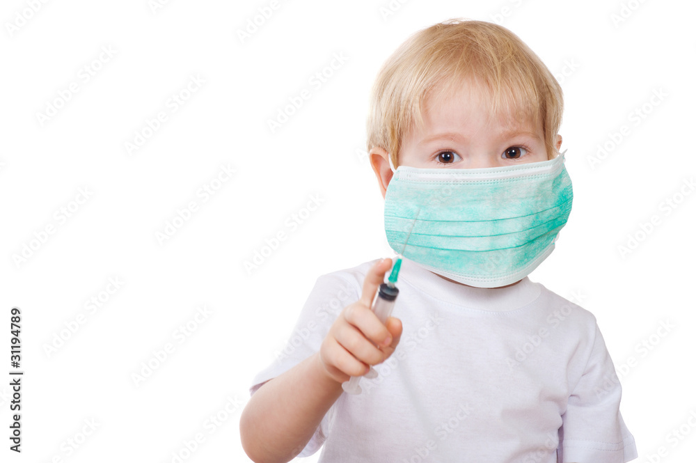 boy in a mask holding a syringe