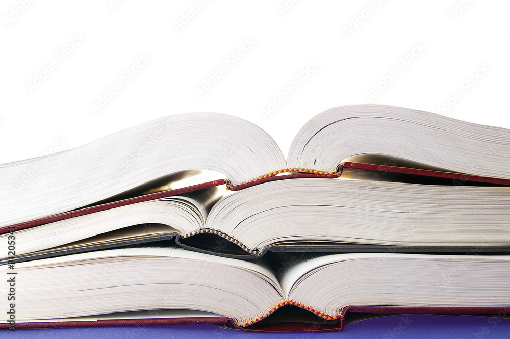 open books stacked, on white open books stacked, on white