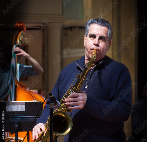 Older Man Playing Sax
