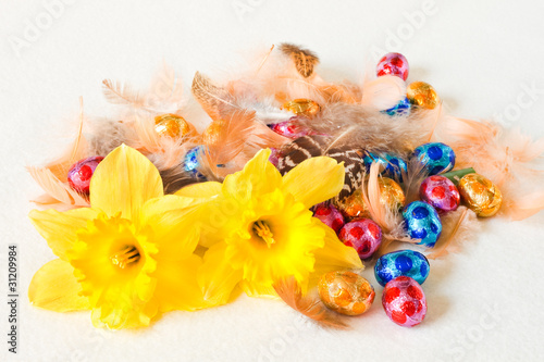 Easter decoration - chocolate eggs and feathers