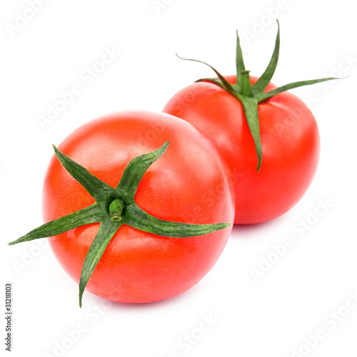 two fresh red tomato isolated on white