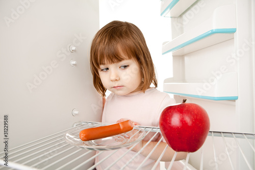 Girl and Empty Refrigerator