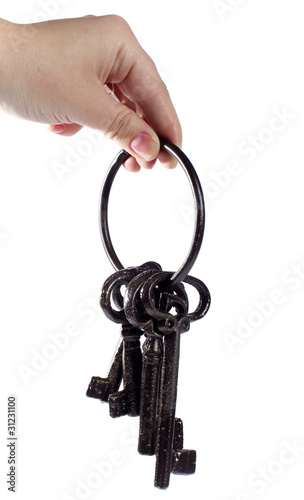 The hand stretches old keys