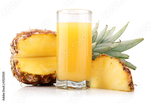 Glass of pineapple juice with fruit and slices isolated
