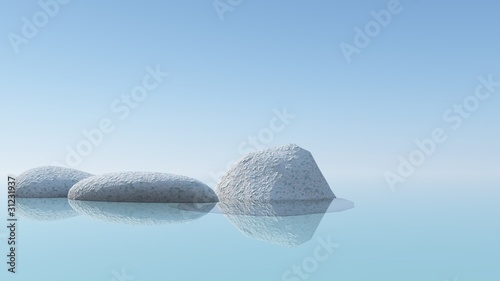 Drei einsame Steine im See