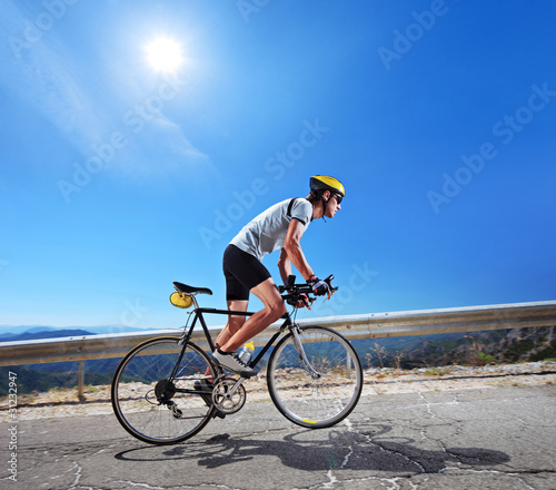 Cyclist riding a bicycle in Macedonia photo