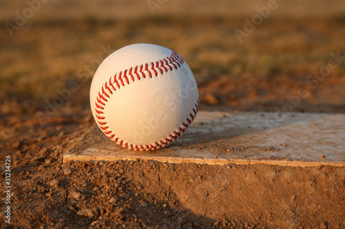 Baseball on Pitchers Mound Rubber
