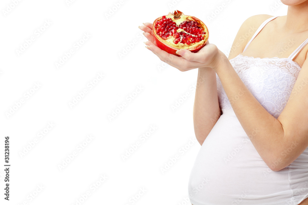 pregnant woman with  pomegranate