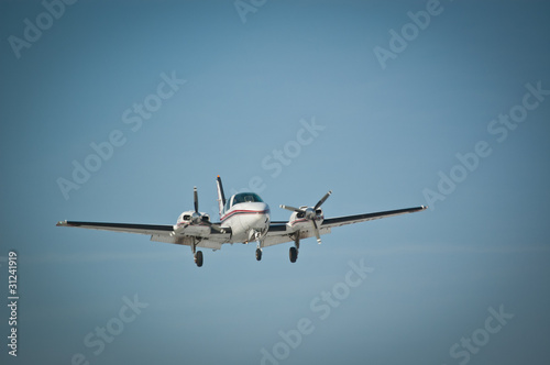 Wallpaper Mural Twin Engine Aircraft in Flight Torontodigital.ca