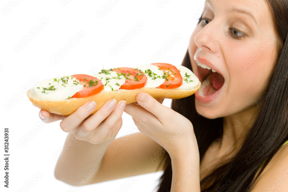Healthy lifestyle - woman eat caprese sandwich Healthy lifestyle - woman eat caprese sandwich