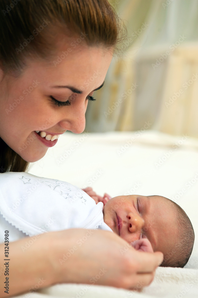 Young beautiful mother and newborn baby boy Young beautiful mother and newborn baby boy