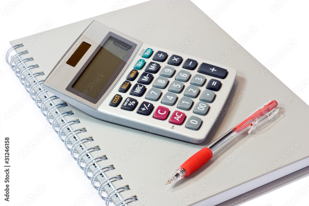 calculator book and pen