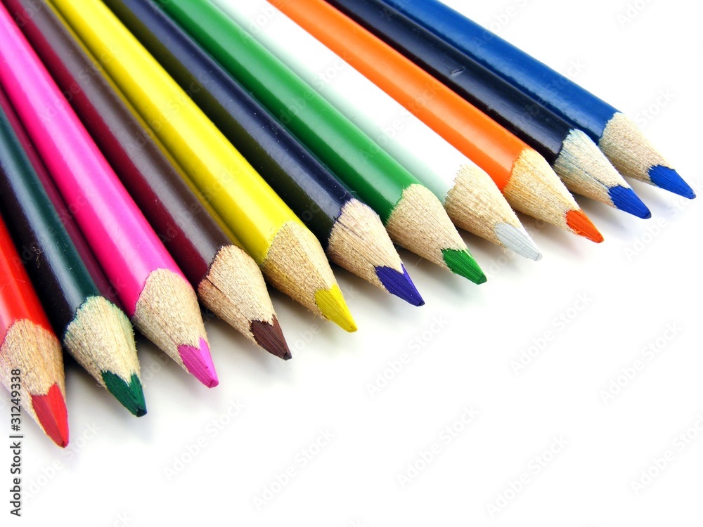 A row of colouring pencils on a white background A row of colouring pencils on a white background