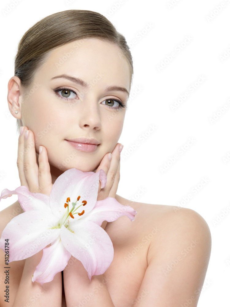 Lily near the pretty face of woman Lily near the pretty face of woman