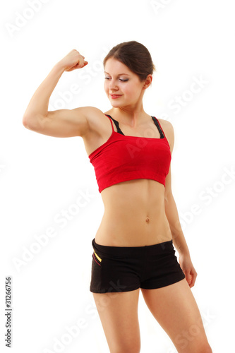 woman beautiful athletic muscular showing muscles isolated on wh