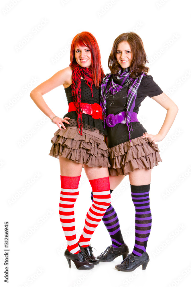 Two good girlfriends happily embracing isolated on white.
