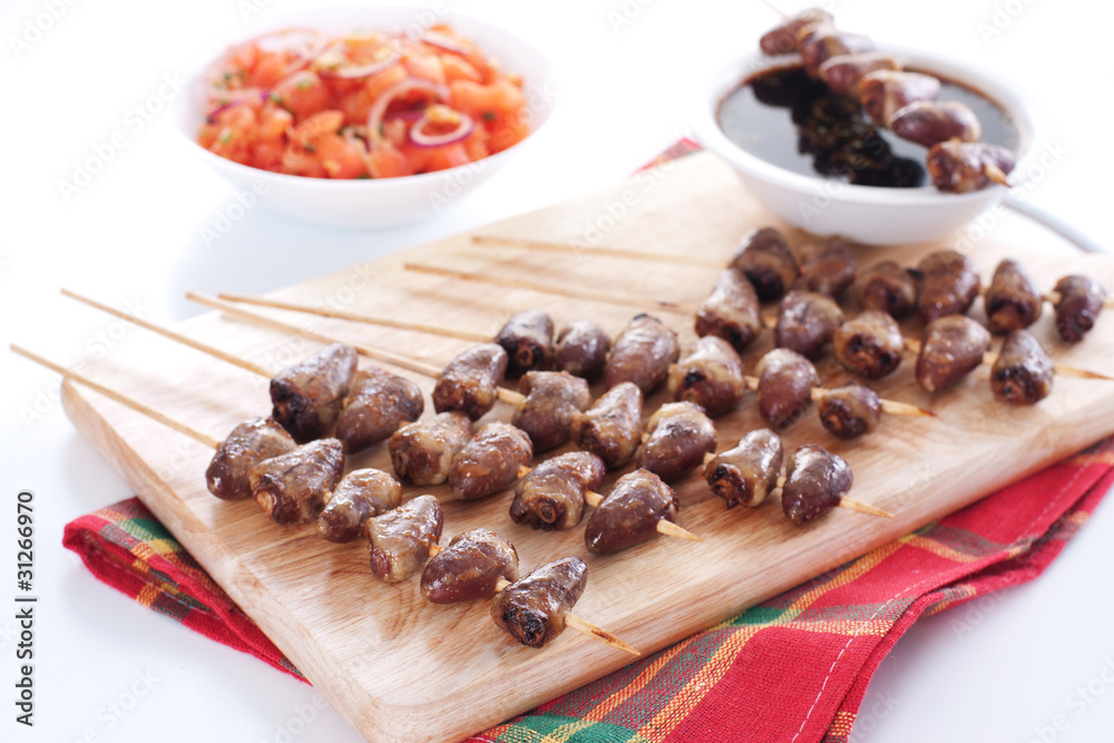 Grilled chicken hearts on skewers Grilled chicken hearts on skewers