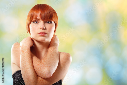 summer teen girl beautiful freckles redheaded over green nature