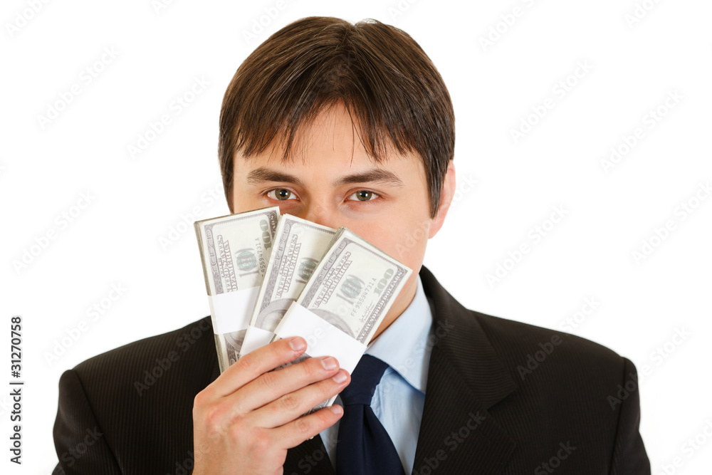 Modern businessman delightfully sniffing hundred dollar banknote Modern businessman delightfully sniffing hundred dollar banknote