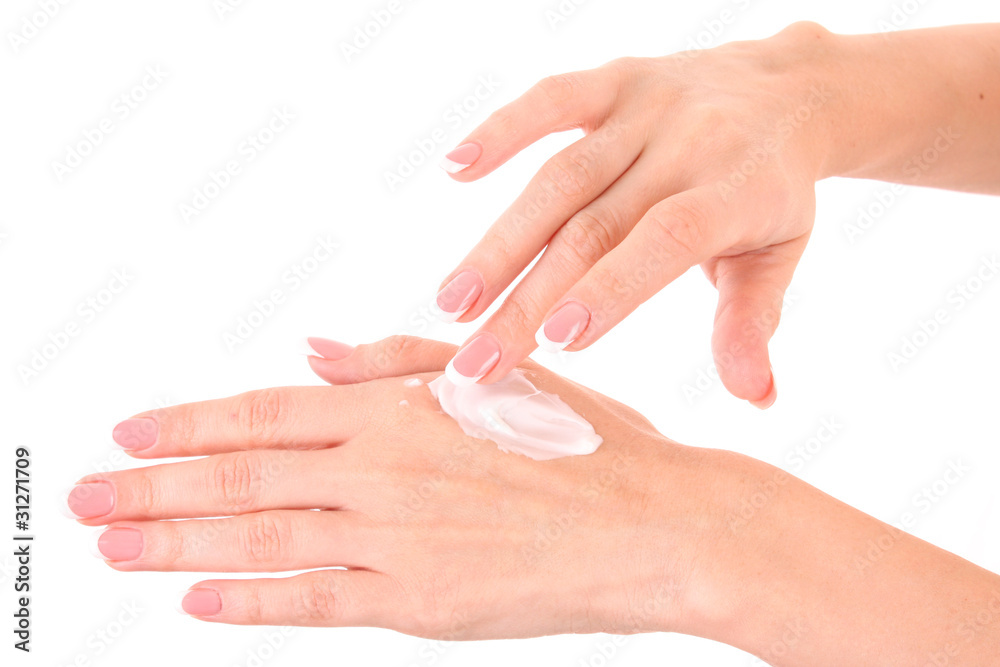 Closeup of beautiful female hands applying hand cream isolated o Closeup of beautiful female hands applying hand cream isolated o