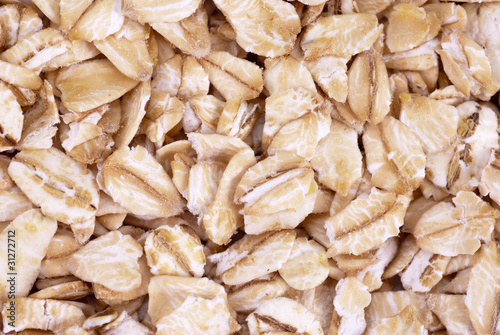 Oatmeal flakes close up as background