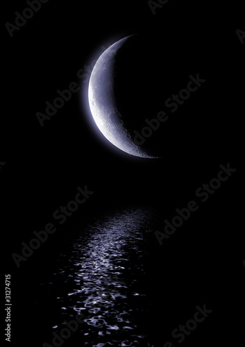 Half of moon in the dark blue sky over water #31274715