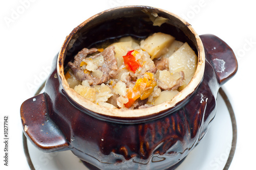 crock pot full of traditional soup photo