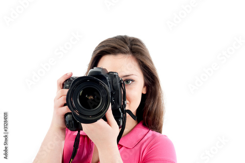 Junge Fotografin beim Fotografieren
