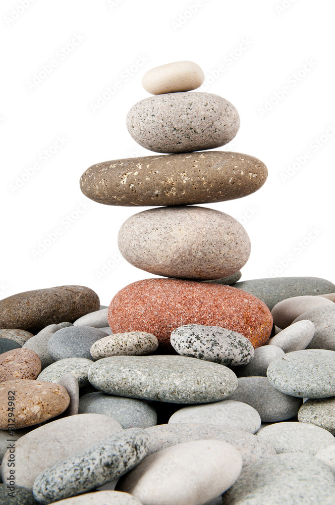 Stack of pebbles isolated on the white Stack of pebbles isolated on the white