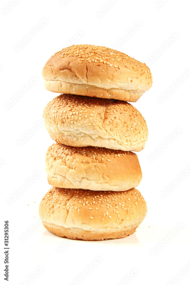 stack of buns with sesame isolated on white stack of buns with sesame isolated on white