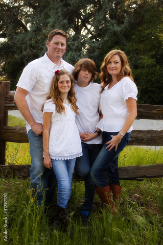 beautiful family of four with teens