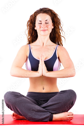 junge Frau beim ausüben einer Meditationsübung © fotogestoeber