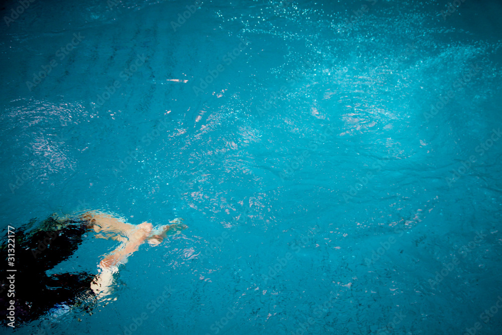 Fototapeta premium swimming in blue pool