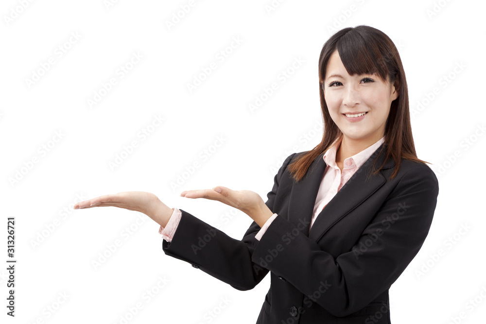 Attractive businesswoman shows your product Attractive businesswoman shows your product